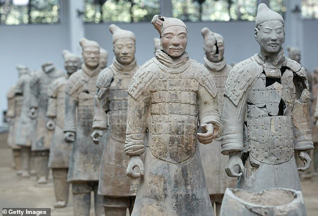 Above, 2,200-year-old terracotta army at Xi'an Qin Terracotta Warrior and Horse Museum