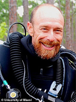 Scientist Kenny Broad (pictured), who attempted to dive Dean's Blue Hole in 2015, will join the Blue Marble expedition to once again try to uncover the secrets of the 663ft abyss.