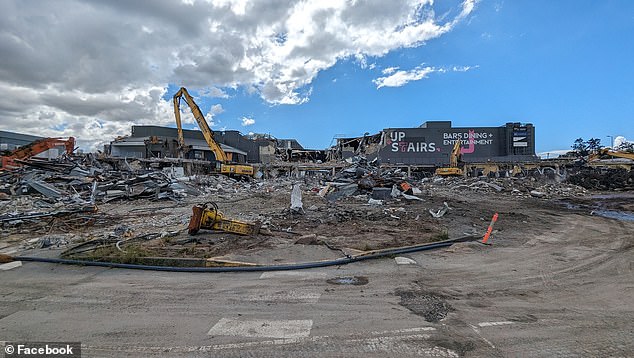 A local resident saw the dog being held at the site of the flood-destroyed Toombul shopping center (pictured)