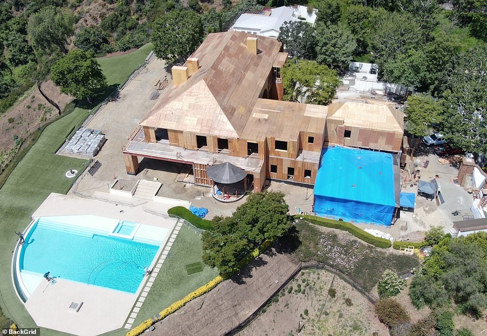 While it's unknown exactly what part of the 18,587-square-foot home the 36-year-old superstar is remodeling, photos from the construction site show he's 'completely' rebuilding the mansion.