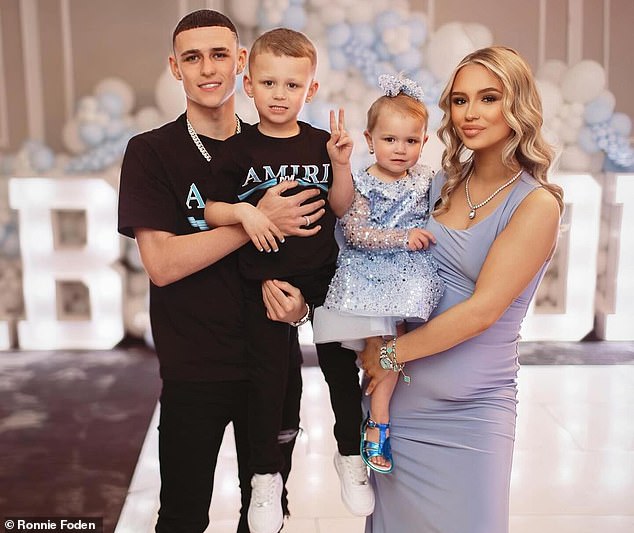 Foden and his girlfriend Rebecca Cooke announced they were expecting their third child in April - pictured with son Ronnie, five, and daughter True, 12 months.