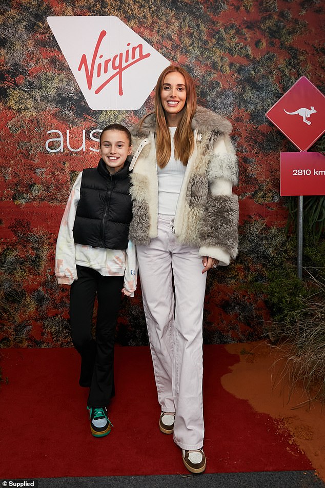 Speaking to Daily Mail Australia during a trip to celebrate Virgin Australia's launch event celebrating direct flights from Melbourne and Brisbane to Uluru, the model revealed she will soon announce an exciting new chapter in her career. (Pictured of her with her daughter Billie)