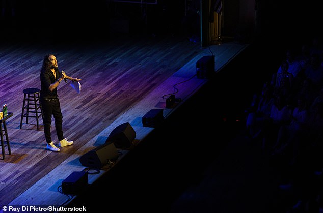 The news of Brand's paycheck comes after the comedian showed his support for presidential candidate Donald Trump on a recent episode of his podcast. Pictured: Brand during his performance at a fundraiser for Robert F. Kennedy Jr's presidential campaign last month.