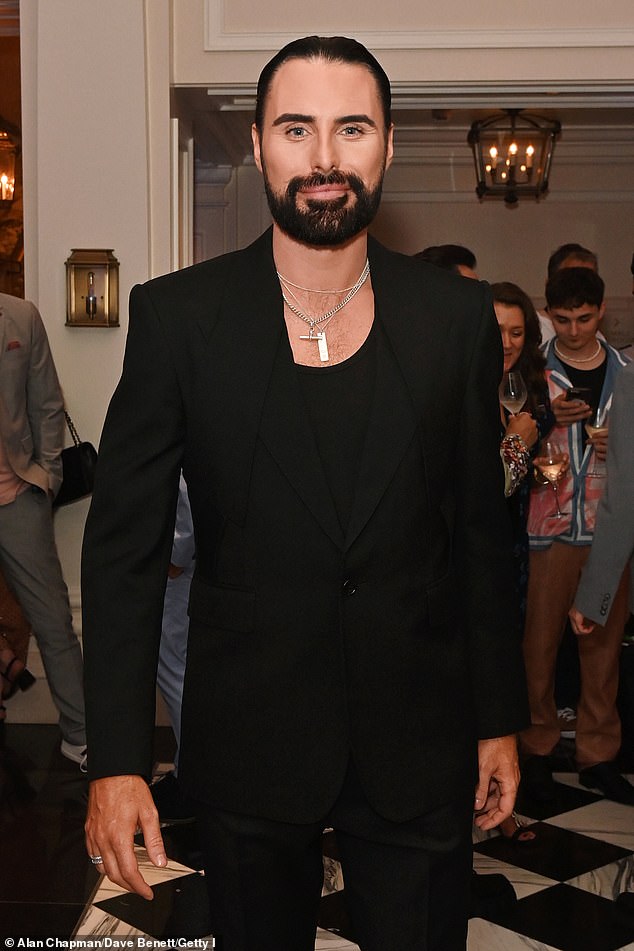 The host, 35, is known for his jet-black locks and perfectly groomed beard, although he commonly sports impeccably applied makeup touch-ups (pictured Wednesday).