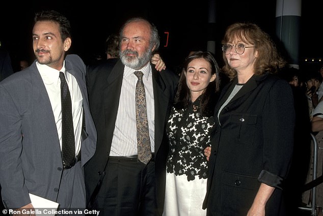 Doherty pictured with her then-boyfriend Rob Weiss, her father Tom and her mother Rosa