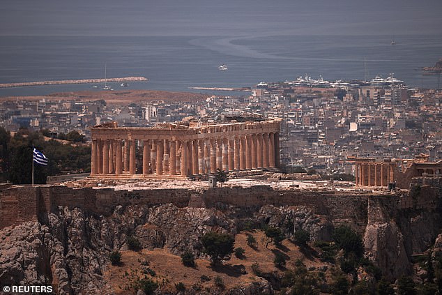 A view of the Parthenon temple as the Acropolis hill archaeological site is closed to visitors due to a heat wave that hit Athens on June 12.