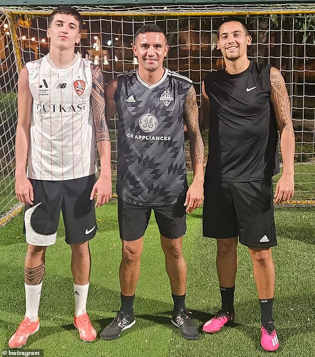 Shae Cahill (pictured left with father Tim, centre) has joined Brisbane Roar on a multi-year deal from Premier League club Everton.