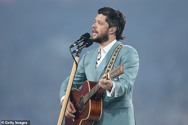 Ahead of the first State of Origin game of 2024, Australian Idol winner Dylan Wright delivered a stripped-down rendition of Advance Australia Fair to a sell-out crowd at Sydney's Accor Stadium. In the photo