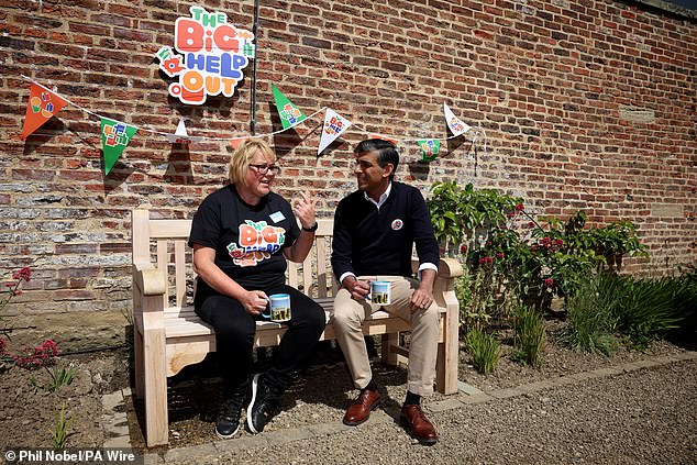 Mr Sunak pictured speaking with Hilary Bellwood during a visit to Bishop Aukland today