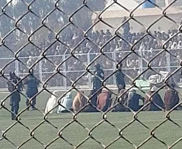 Taliban brutally flogged nine men during public trial in packed football stadium