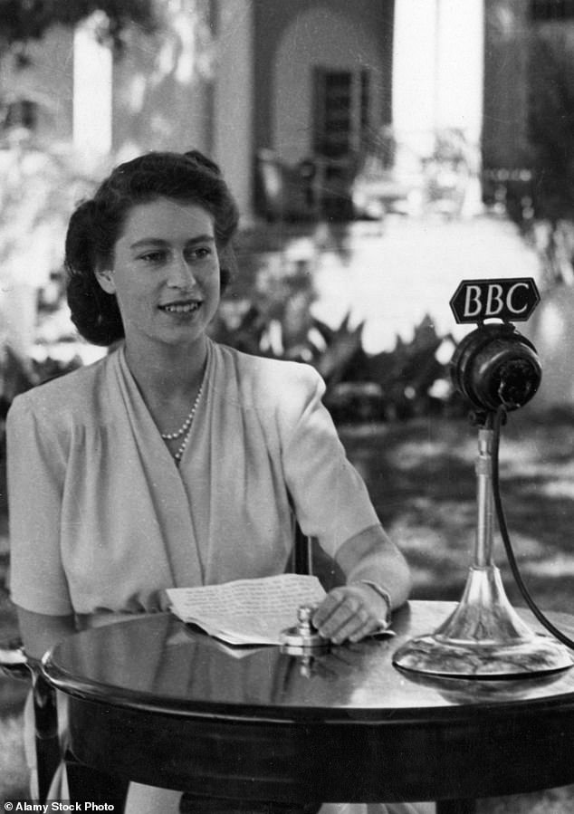 Princess Elizabeth sits in front of a BBC microphone as she delivers her address to Britain and the Commonwealth from Government House in Cape Town.