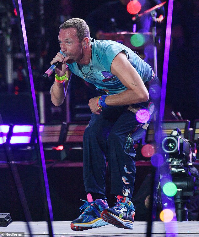 Coldplay made history by becoming the first band to headline Glastonbury five times on Saturday (frontman Chris Martin pictured)