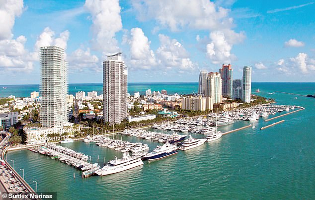 The Houston-born rapper, who has two young children, Stormi and Aire, with Kylie Jenner, was arrested by police at the Miami Beach Marina (pictured from above)