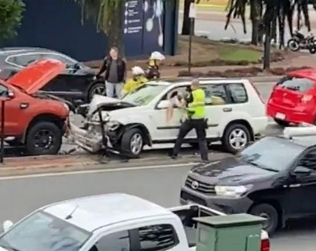 In other images filmed by a bystander, the officer repeatedly hits the man 