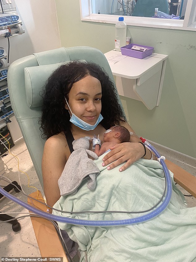 The young mother appears holding her newborn son. She was just 18 when she discovered she was pregnant while working a shift at Nando's.