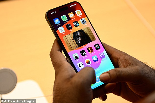 Since last year, the EU forced Apple to put USB-C charging ports on iPhones. A customer holds an iPhone 15 in a store in Los Angeles, California, on September 22, 2023, the day of the global launch.