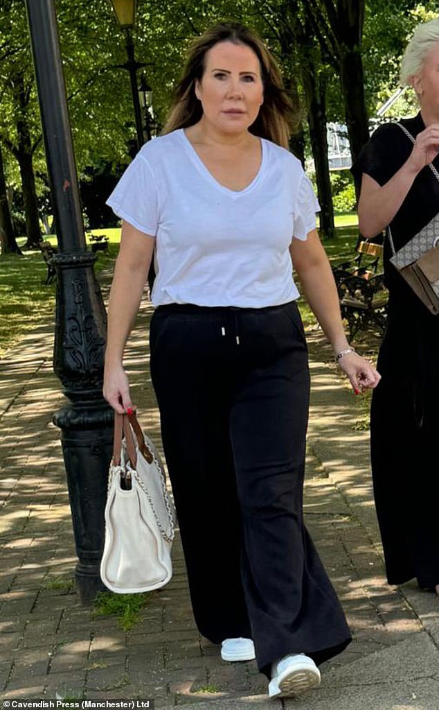 Jackson was photographed outside Warrington Magistrates' Court. She was eventually reported to the police and when officers arrested her, they found a mail bag at her home.