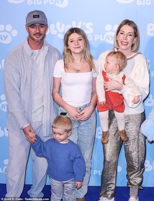 The couple are seen with their children Fenna and Fred, as well as Katherine's daughter Violet from a previous relationship.