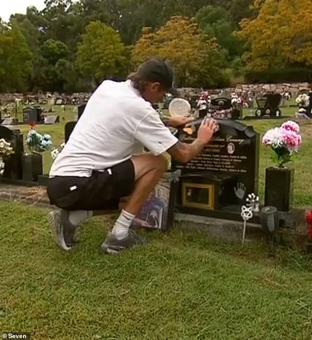 The tiara had been placed inside a closed glass box that was attached to Brittney's grave (pictured)