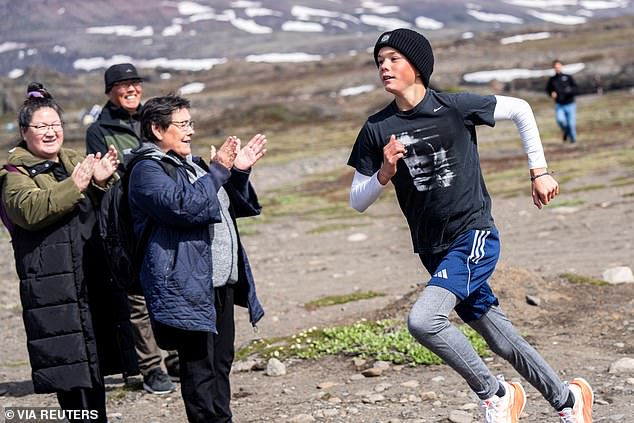 Locals applauded when Prince Vincent of Denmark ran the Family Mile at the Qeqertarsuaq Race during a visit to Qeqertarsuaq.