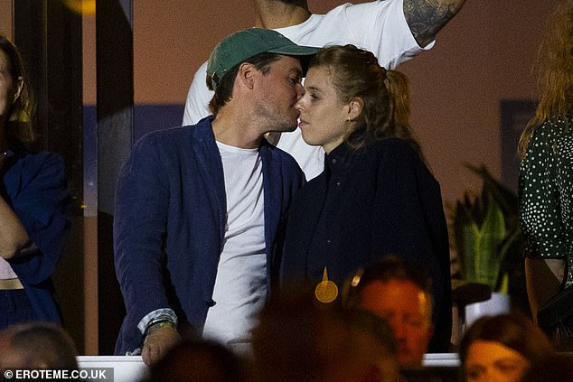 Edoardo Mapelli Mozzi seen whispering to his wife, Princess Beatrice, during the set of Kings of Leon