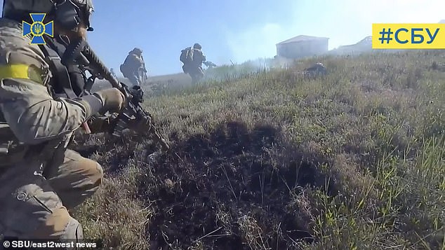 Front-facing camera footage shows troops firing on enemy soldiers to liberate the remote but strategically important island, giving a major boost to the Ukrainian resistance.