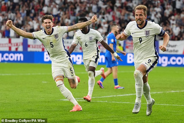 England's players will reportedly share a £14m bonus if they win the Euros this year. Pictured: John Stones and Harry Kane