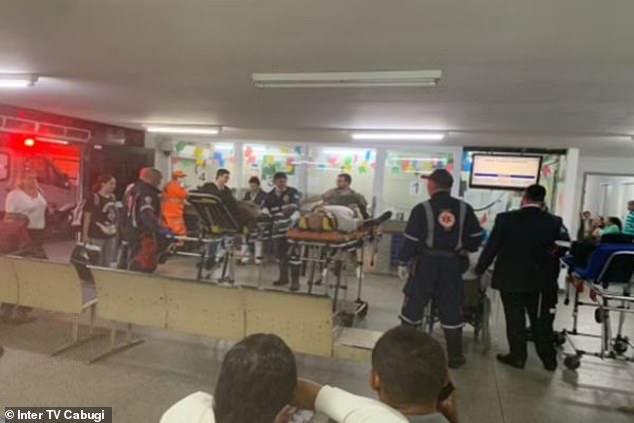 Rescuers assisted passengers of Air Europa flight UX045 at Governador Aluízio Alves International Airport early Monday morning