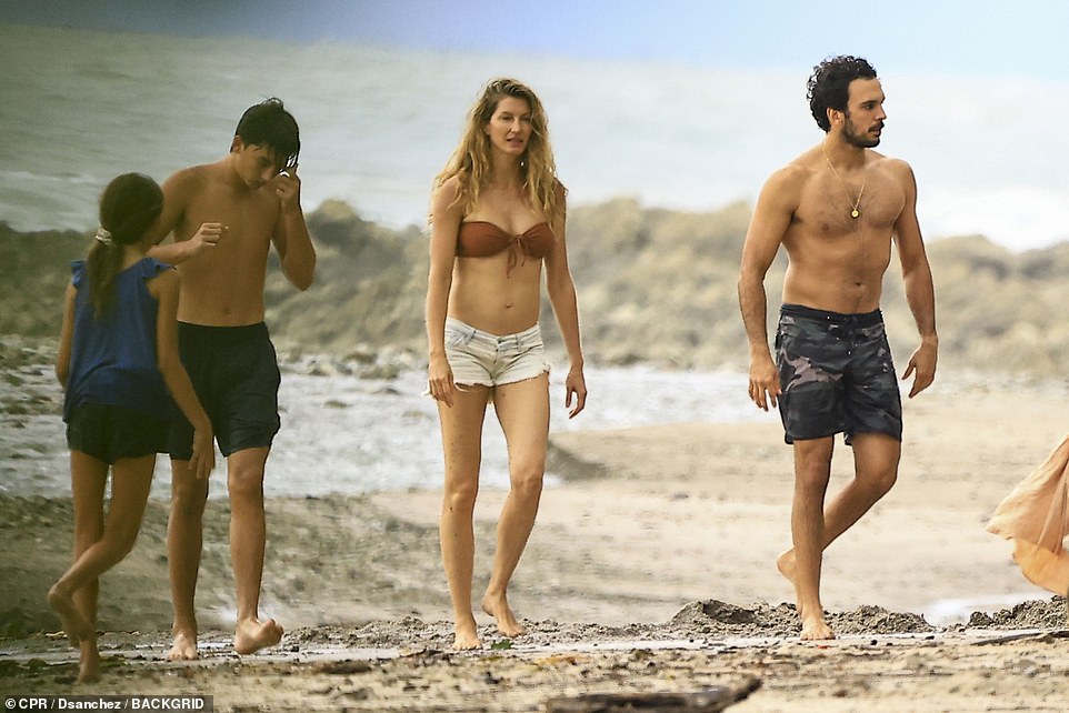 The star was seen on the beach with her two children and Joaquim