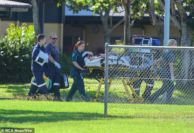 The crash claimed the lives of a 56-year-old Townsville woman, Emma 'Alli' Sailor, and two German women aged in their 20s and 30s (pictured, paramedics at the scene in Gumlu)