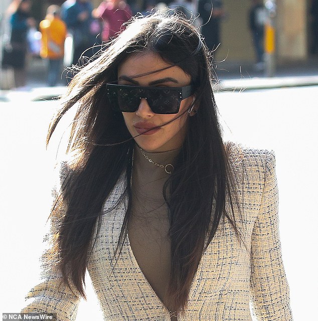 On Tuesday, Daizli (pictured) wore a short, fitted beige dress and a long white jacket with black high heels, believed to be Christian Louboutin, as she appeared at Sydney's Downing Centre District Court ahead of her trial. She also wore Louis Vuitton sunglasses.