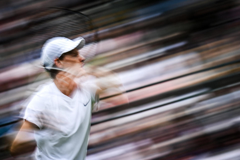 Sinner returns a serve to Germany's Yannick Hanfmann. (Ben Stansall/AFP via Getty Images)