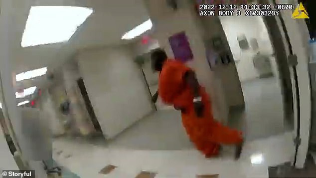 The footage shows Wright running from the bathroom through the hallways of the emergency room in an attempt to escape.