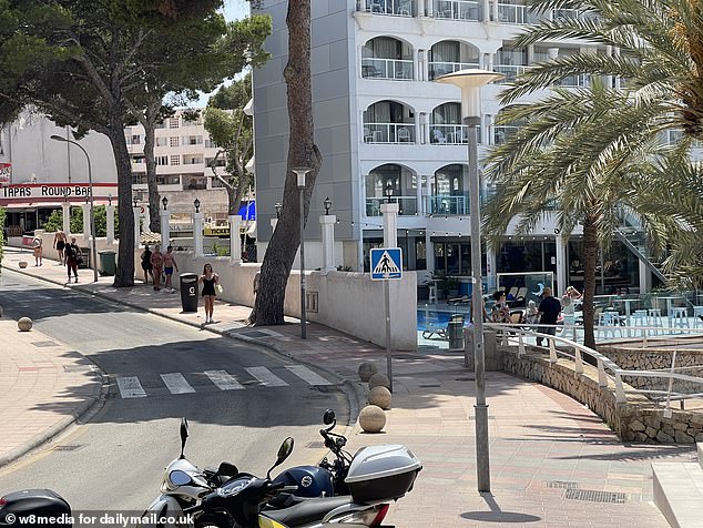 It has emerged that Mr Grant was a popular family man from Ireland who had gone missing after a night of partying. Pictured: A view of the street where the man was found this morning