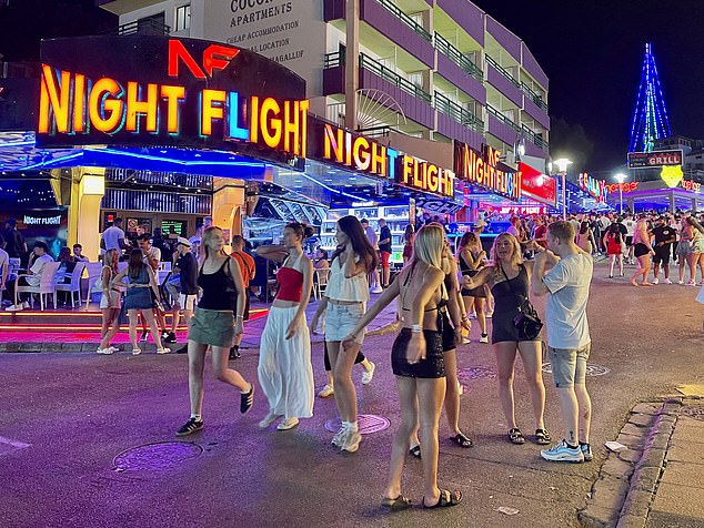 Pictured: Crowds of tourists took to the strip late into the night as they continued to party.