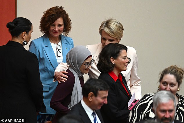 Senator Payman receives a hug from Tanya Plibersek