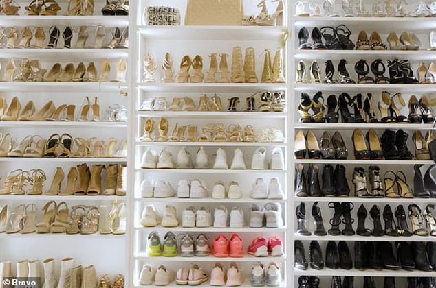 You can see every pair of shoes she owns on the luxurious looking shoe racks that are built into the wall of her closet.