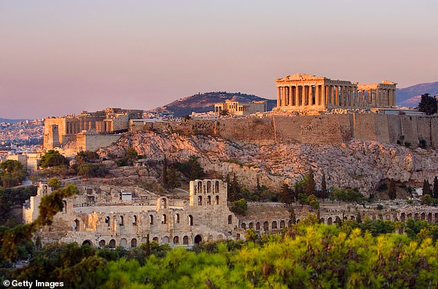 Critics say the move will give employers an excuse not to hire urgently needed additional staff and leave more young people out of work (pictured: general view of the Acropolis in Athens, Greece)