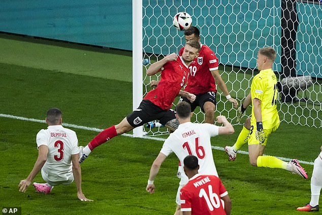 Demiral (left) scored from close range to give his team a 1-0 lead in the first half of what was a frenetic game.