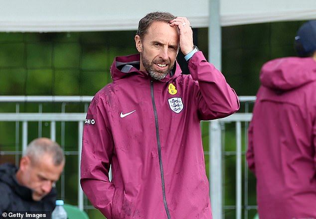 England manager Gareth Southgate, pictured at Monday's training session, has decisions to make