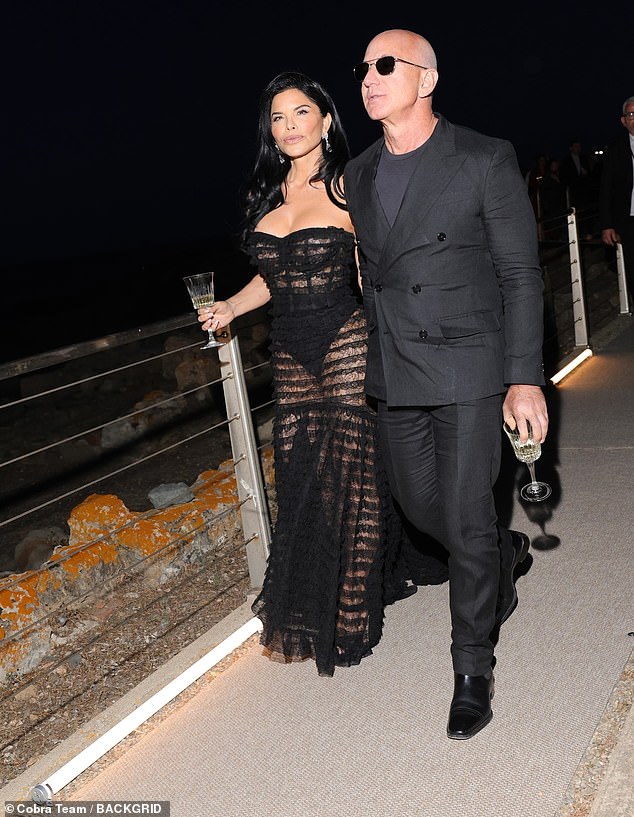 Billionaire Jeff Bezos and Lauren Sanchez were also in attendance, with Lauren wearing a chic sheer black maxi dress by the fashion house.