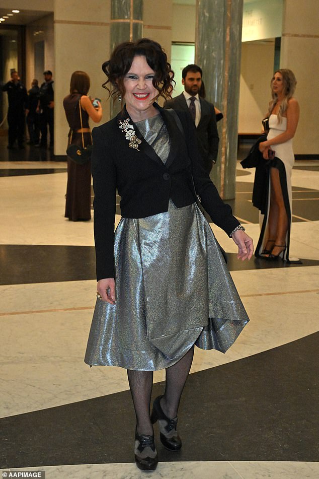 ABC journalist Annabel Crabb arrived in a chic silver dress and black jacket.