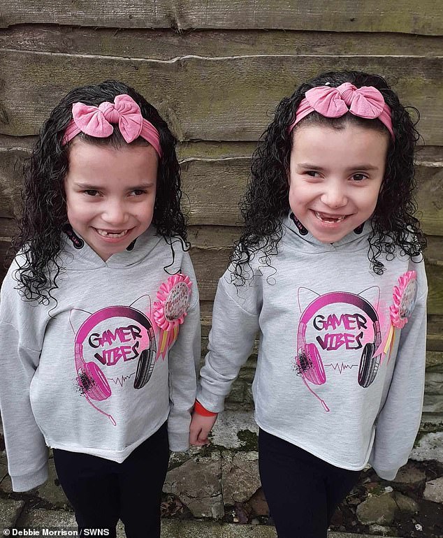 In May, Shaylisha was forced to miss school after suffering from diarrhoea and vomiting for days. But one night, after falling asleep on the sofa, her panicked father Eddie went to check on her and found her unconscious. Pictured here, Shaylisha Morrison (right) with her sister Chardonnay Morrison (left).