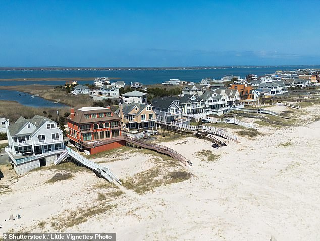 At least one vacation spot in Havens Beach, the exclusive town of East Hampton in New York, has been closed due to problems with the presence of fecal matter and bacteria. Above, an aerial view of some homes in the Hamptons