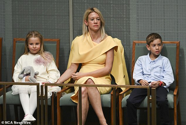 This is not the first time Chalmers has worn his style to a political event. Pictured here in Parliament, he is joined by the couple's two children, Leo and Annabel.