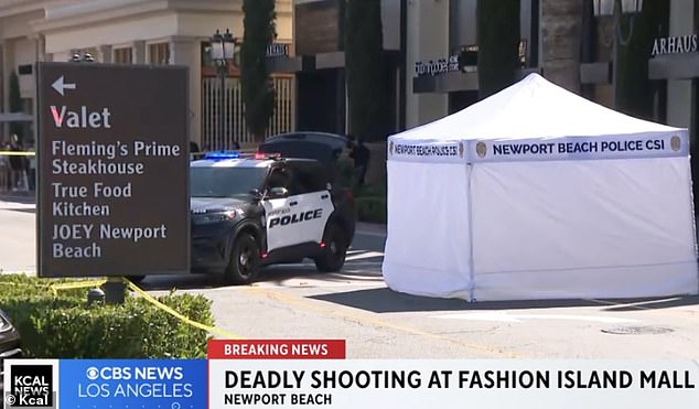 Images show a white police forensic tent in the car park at the scene of the attack.