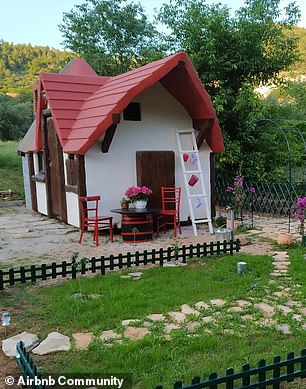 The little fairytale castle has plenty of outdoor space with table and chairs, bench, fire pit, outdoor kitchen and barbecue.