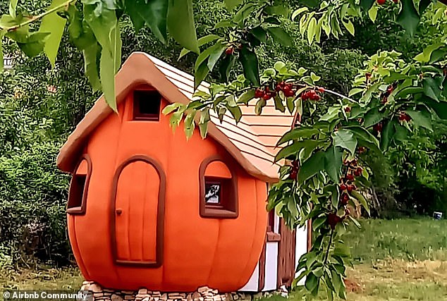 The Magic Pumpkin is a bright orange round house designed to look like a giant winter squash.