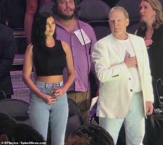 The sold-out WNBA game drew enthusiastic fans and Aces owner Mark Davis (right)