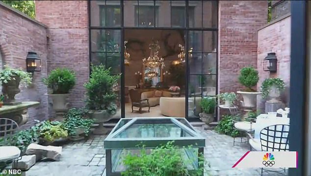 The incredible Manhattan home even has a fairytale backyard and a garage.